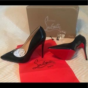 Christian Louboutin- Red bottom heels